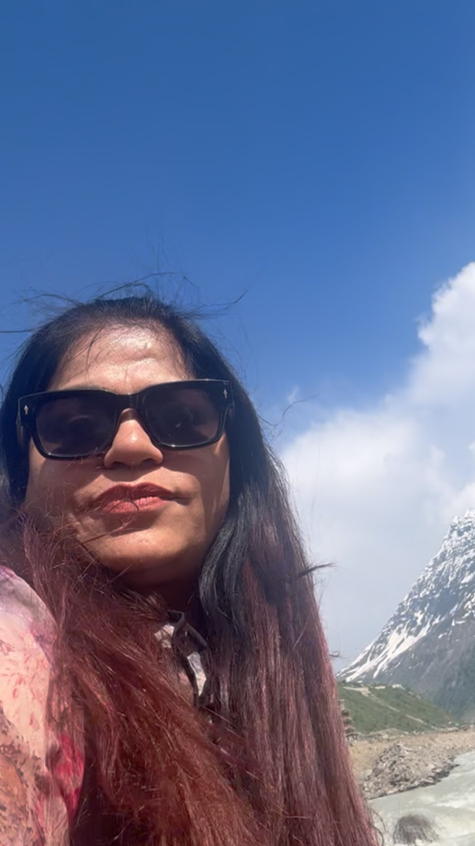 A SoulTraveller guest beneath a clear Himalayan sky